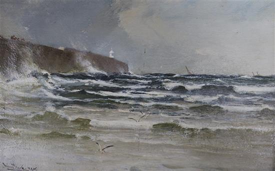 Julius Hare (1859-1952) two oils on canvas, Caernarfon Castle and Coastal scene, signed 22 x 35cm.